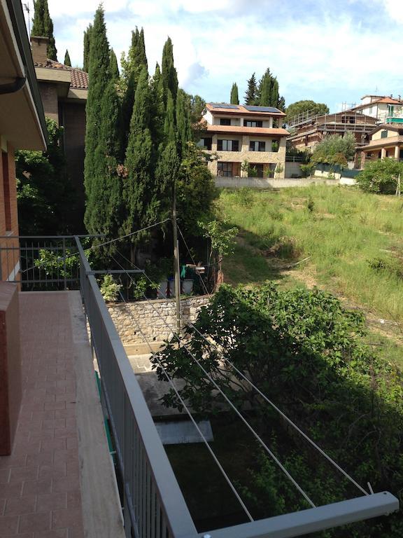 Апартаменты Casarimidia Перуджа Номер фото